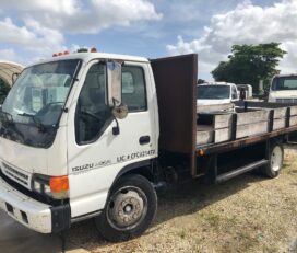 Camiones En Venta 2002 Isuzu NQR Flatbed Truck, Miami, Florida